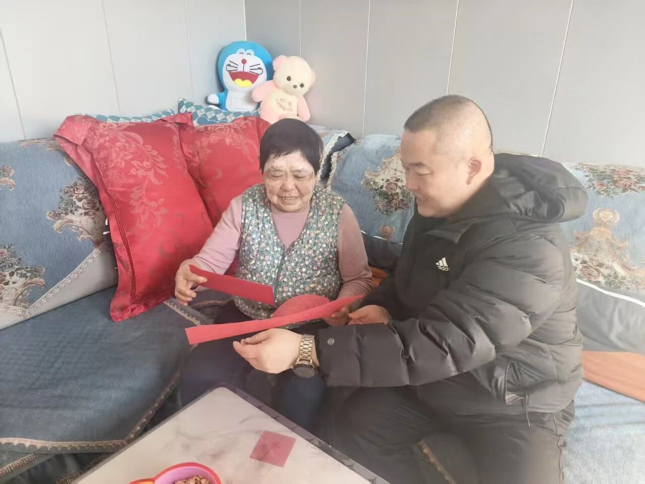 “深入基层听民意，暖心服务迎新春”主题党日活动  图片1.jpg
